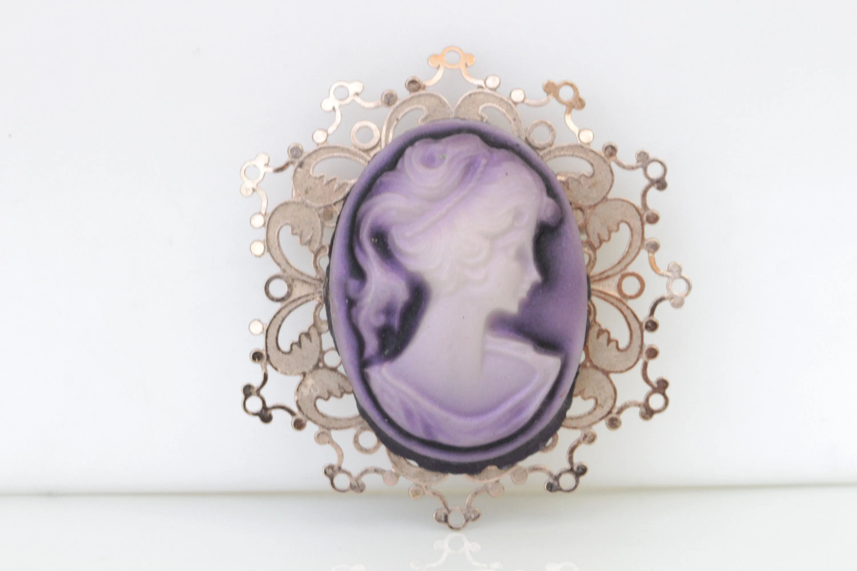 PURPLE CAMEO BROOCH