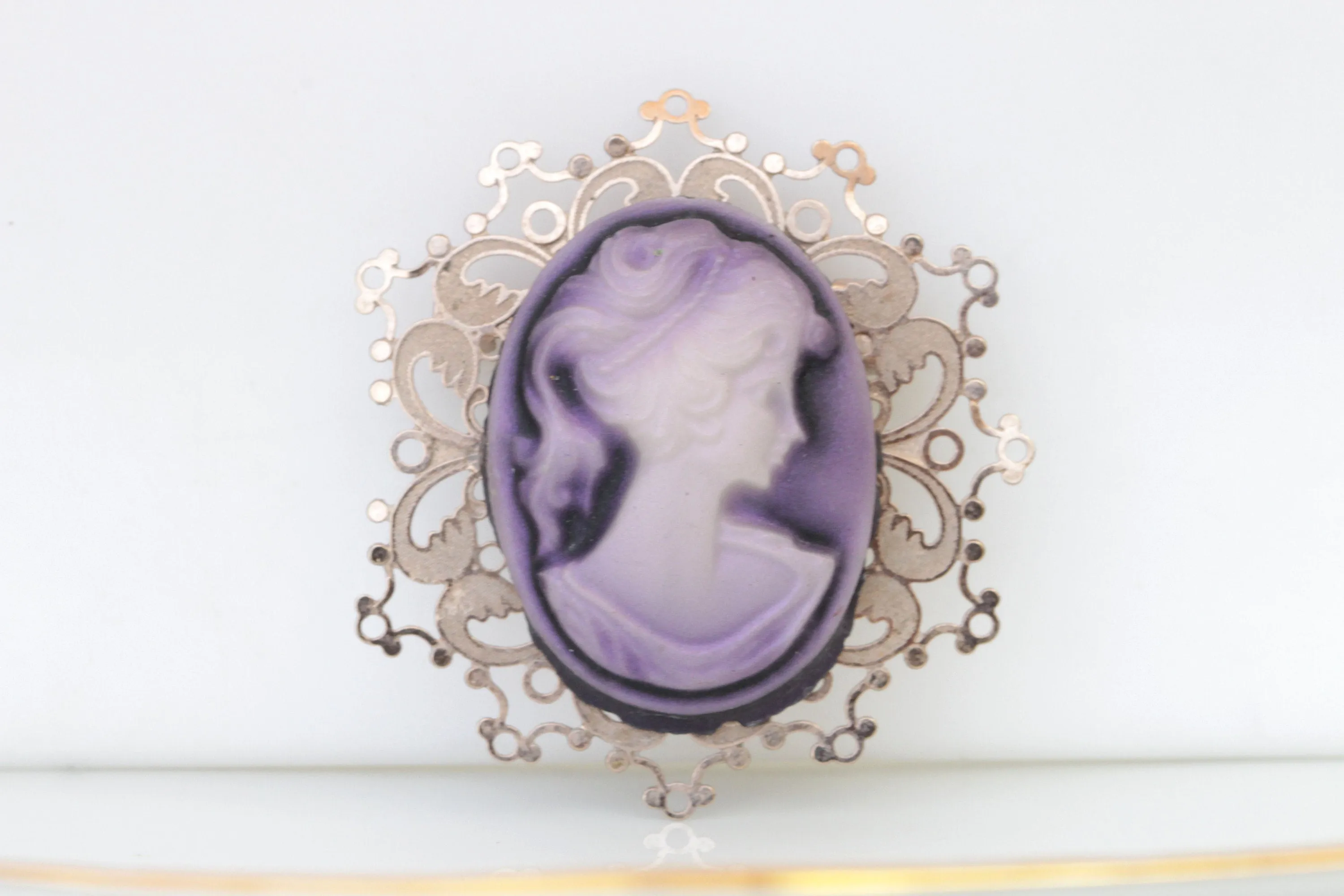 PURPLE CAMEO BROOCH